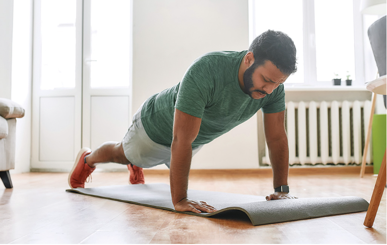 Doing push-ups can help prepare you physically for the trails this spring. Photo credit Adobe Stock.