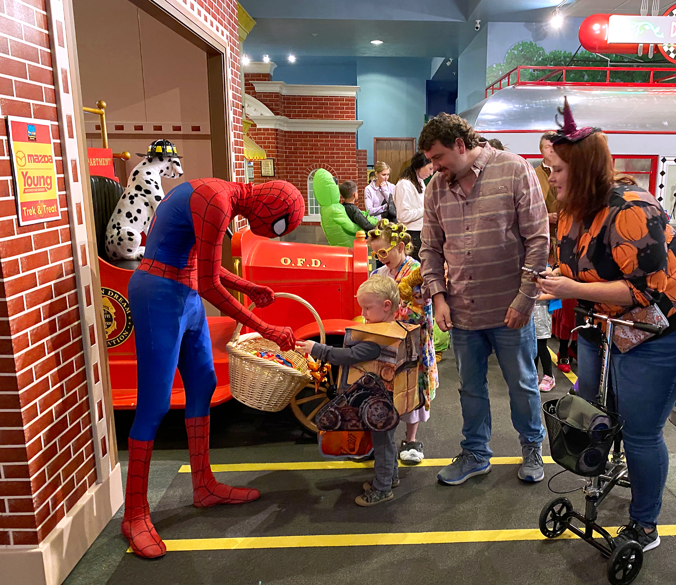Costumed characters meet kids for Halloween at Treehouse Museum
