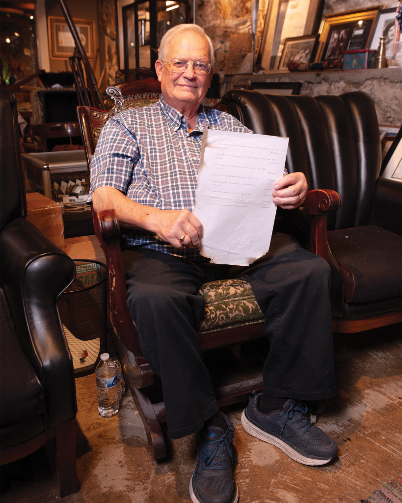 Brent Ashworth sits in Brigham Young’s rocking chair, holding an itemized list from Hofmann that was retrieved from his vehicle after the 3rd explosion.