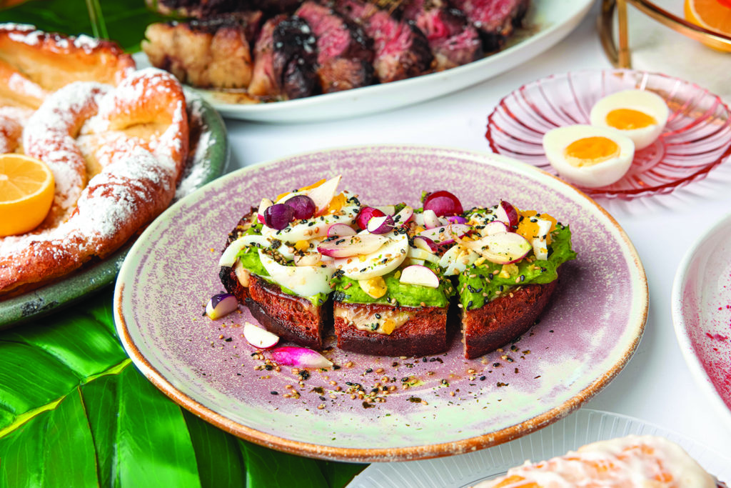 Avocado toast with rye bread furikake, radish, boiled egg, lemon and sesame dressing from Sunday's Best

