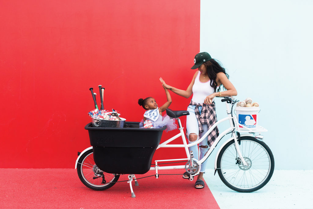 Family riding bucket bike