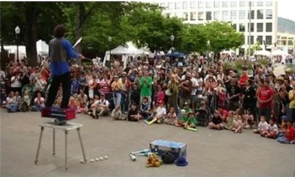 Marcus Wilson performs for a crowd in downtown Salt Lake City