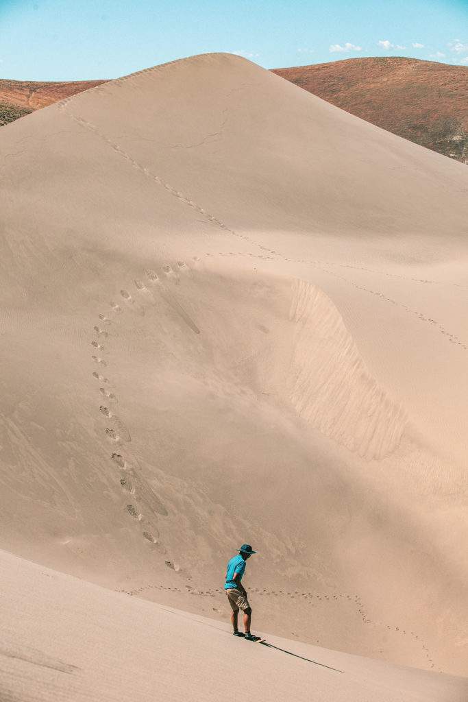 Sand boarding at Bruneau Dunes State Park in Idaho
