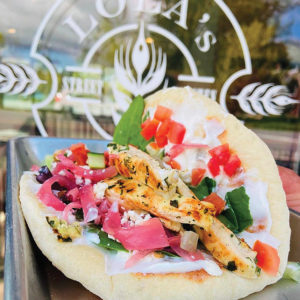Lola's grilled chicken gyro outside of Lola's Street Kitchen