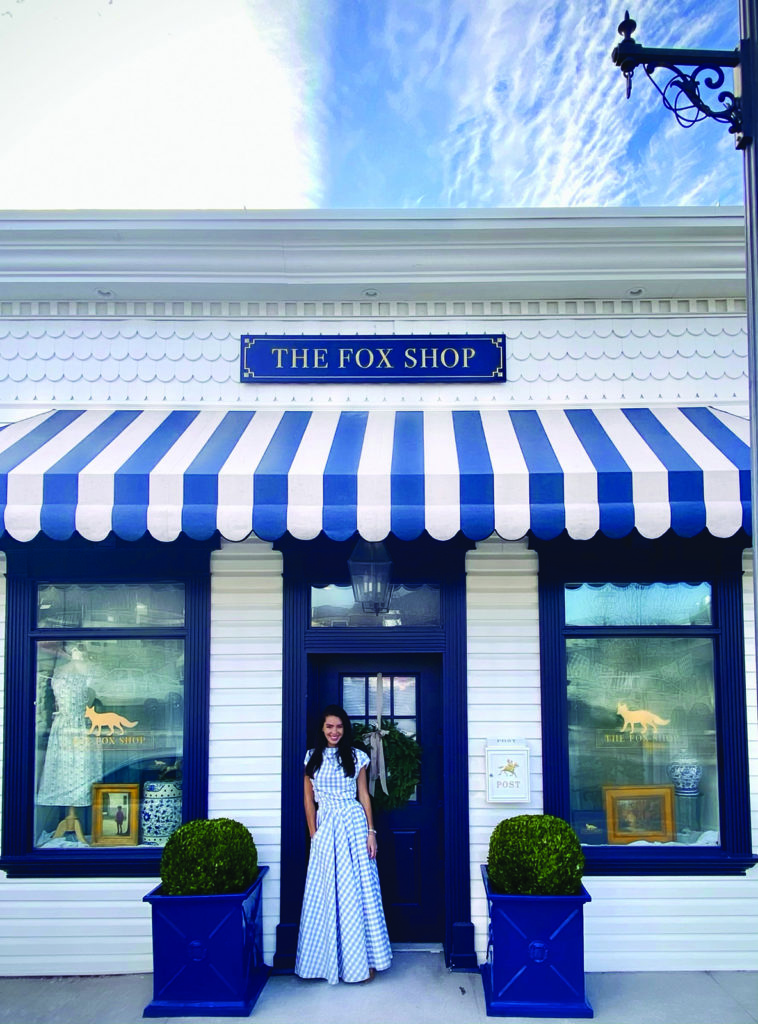 Cara Fox stands in front of The Fox Shop